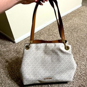 Michael Kors purse color vanilla practically new used once